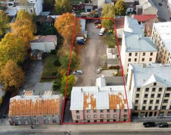 Продается офисное здание и земельный участок.  Продаются 2/3 доли в общей Рига