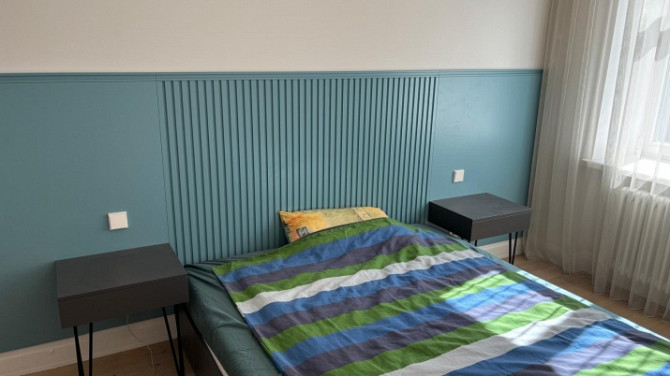 Pašā pilsētas centrā, pilnībā renovētā mājā, tiek izīrēts jauns divistabu dzīvoklis ar Rīga - foto 8