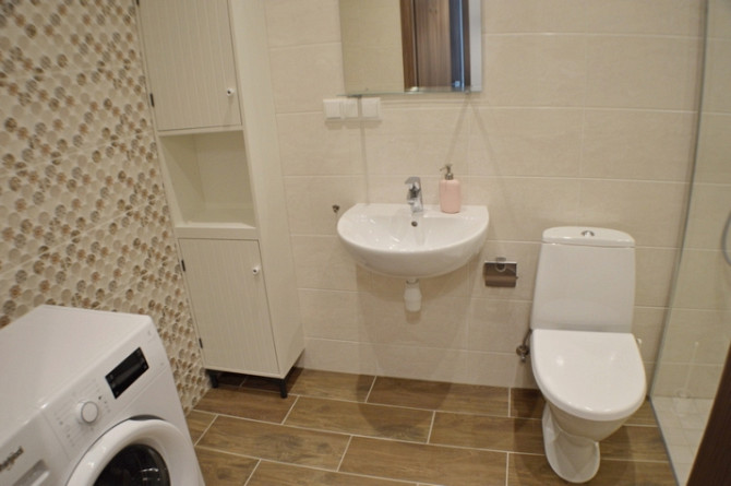For rent new, modern studio apartment in a new house  + new furniture and home appliances + balcony  Рига - изображение 5