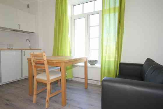 Furnished two rooms apartment on the Aleksandra Caka street, opposite the Center sports quarter.  Ad Rīga