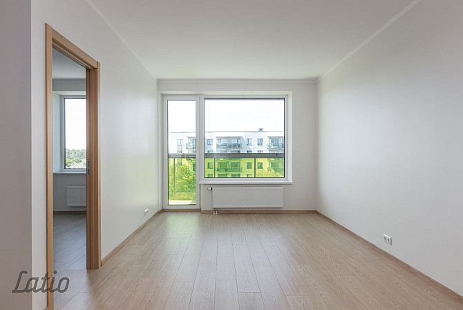 Pārdošanā funkcionāls un kvalitatīvi izbūvēts 2 istabu dzīvoklis modernā dzīvojamā Rīga - foto 1