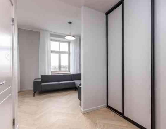 Apartment with a Wonderful View of Old Riga and the Daugava Bridges, Available for Long-Term Rent  L Рига