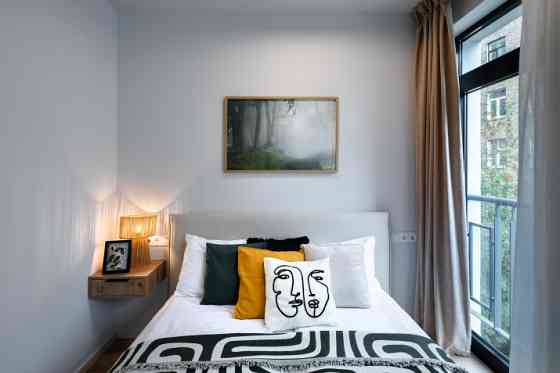 A modern and meticulously designed studio apartment is available for reservation at Ernesta Birzniek Рига