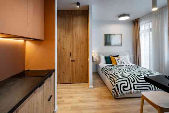 A modern and meticulously designed studio apartment is available for reservation at Ernesta Birzniek Рига
