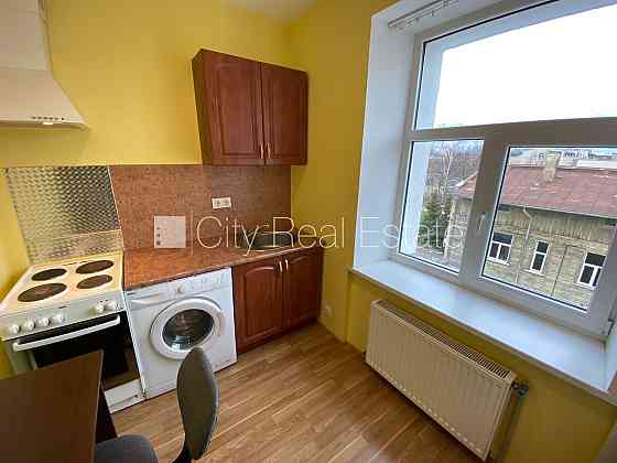 Фасадный дом, реновированный дом, закрытый двор, вход с улицы, лестничная клетка Рига