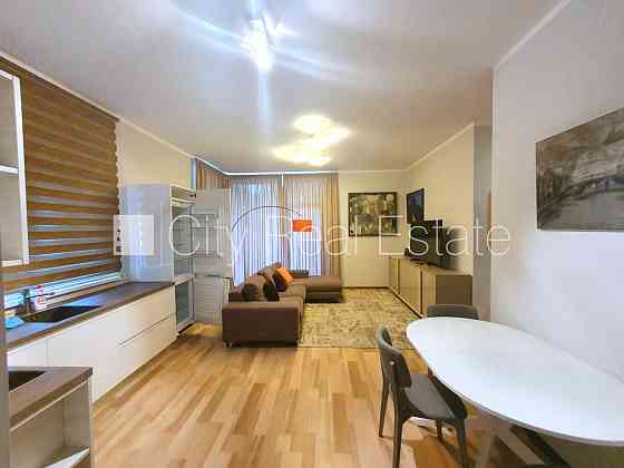 Земля в собственности, новостройка, фасадный дом, количество квартир в здании 12 Юрмала