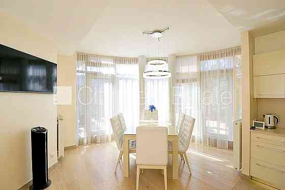 Земля в собственности, новостройка, монолитные бетонные стены, на подвальном Юрмала