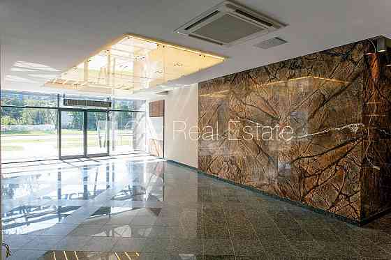 Новостройка, фасадный дом, плата за обслуживание одного квадратного метра в Рига