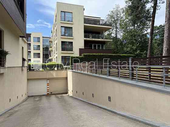 Проект - Jūras Pils (Юрас Пилс), гаражные ворота оснащены автоматической подъёмной Юрмала