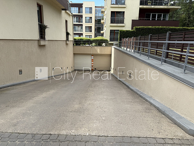 Проект - Jūras Pils (Юрас Пилс), гаражные ворота оснащены автоматической подъёмной Юрмала - изображение 3