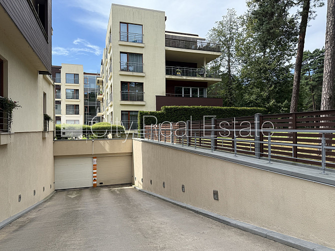 Проект - Jūras Pils (Юрас Пилс), гаражные ворота оснащены автоматической подъёмной Юрмала - изображение 2