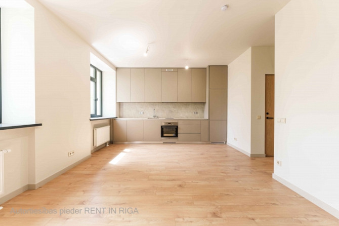 Современная и продуманная до мелочей 2-комнатная квартира по адресу Лиелирбес 9a Рига - изображение 2