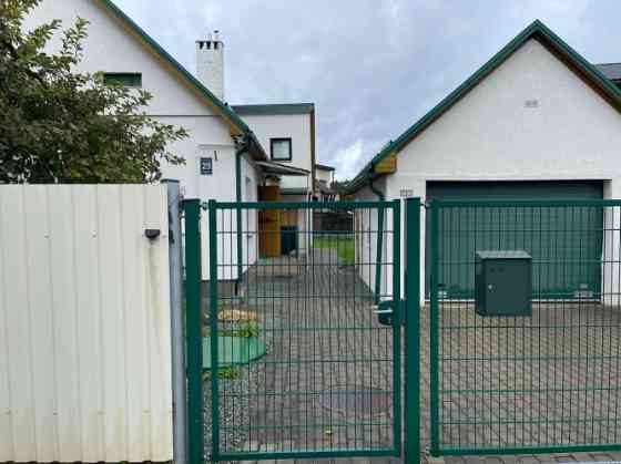 В продаже просторный и многофункциональный дом в Огре с двумя отдельными Огре и Огрский край