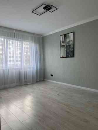 Продается светлая и тёплая квартира после ремонта, земля в собственности. Рига