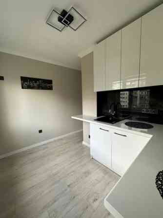 Продается светлая и тёплая квартира после ремонта, земля в собственности. Рига