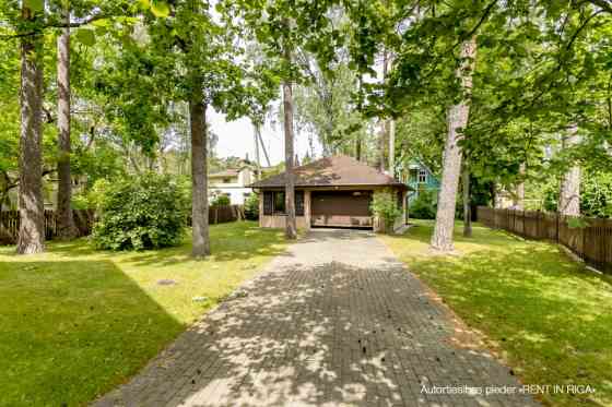 For rent a 2-storey house in Jurmala with a well-kept area and a garden.  100 m to the swimming plac Jūrmala