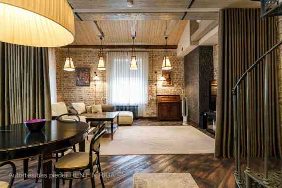 Эксклюзивная двухуровневая квартира в Тихом центре  элегантность, архитектура и Rīga