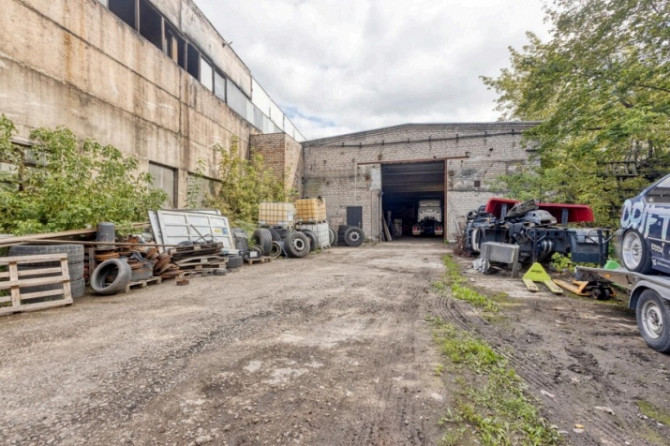 Помещения для автосервиса по адресу Ilzenes 1B, 450 m:  Ворота 3,4 м x 4,3 м, позволяющие Рига - изображение 1