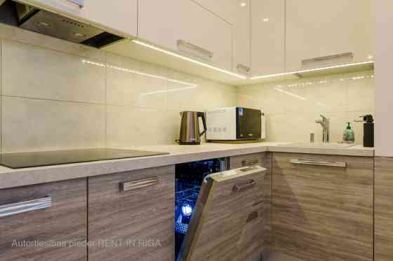 Элегантная и просторная 3-комнатная квартира "Упиша Пасажа"  Она расположена в Rīga