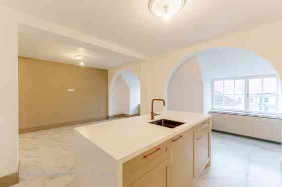 An elegant Art Nouveau building at 7 Ausekļa Street is located in the most prestigious part of the Q Rīga