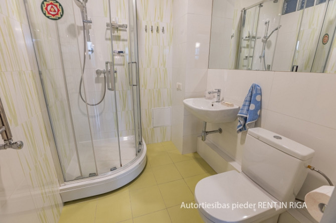 Tiek izīrēts plašs divstāvu 4 istabu dzīvoklis (138 kv m) ar lielu terasi un balkonu (kopējā Rīga - foto 9