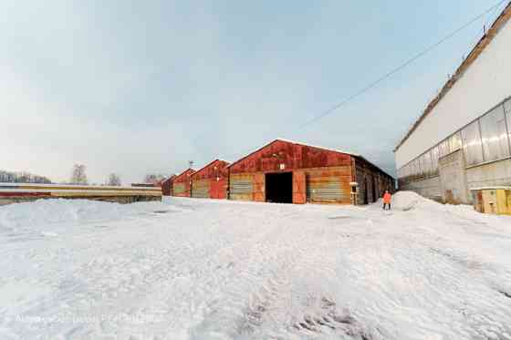 Warehouse No. 20 in the industrial area at 24 Braslas Street.  A metal hangar with one large space m Rīga