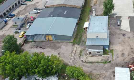 Metal hangar with columns.  Level concrete floor. Inside the hangar there is a 37 sq.m brick buildin Рижский район
