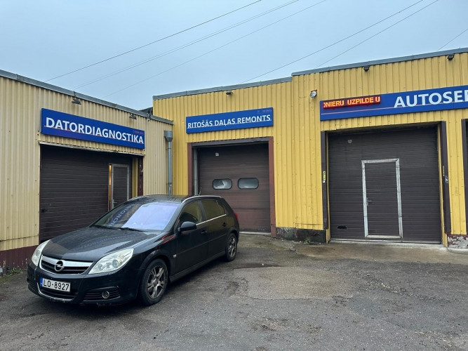 Auto servisa telpa ar iebrauktuvi/paceļamajiem vārtiem Ganību dambī.  Ierīkots telferis. Rīga - foto 1