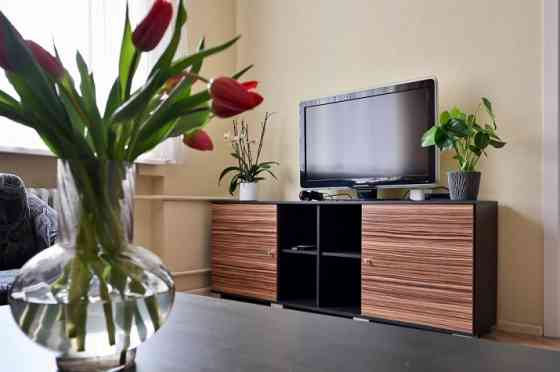 A furnished two-bedroom apartment in the very center of the city, which at the same time allows you  Rīga