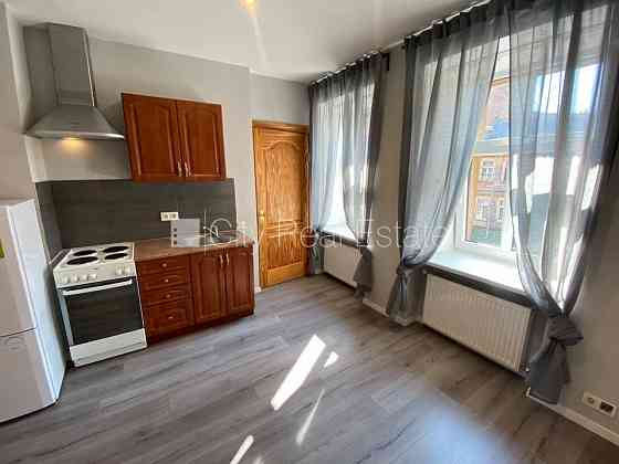 Фасадный дом, реновированный дом, благоустроенный озеленённый двор, закрытый Рига