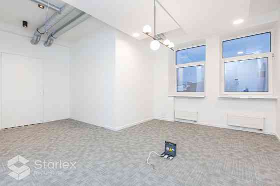 Стильный офис с живописным видом на Даугаву.  Общая площадь 341 м2. Офис расположен Rīga