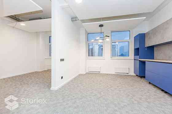Стильный офис с живописным видом на Даугаву.  Общая площадь 341 м2. Офис расположен Rīga