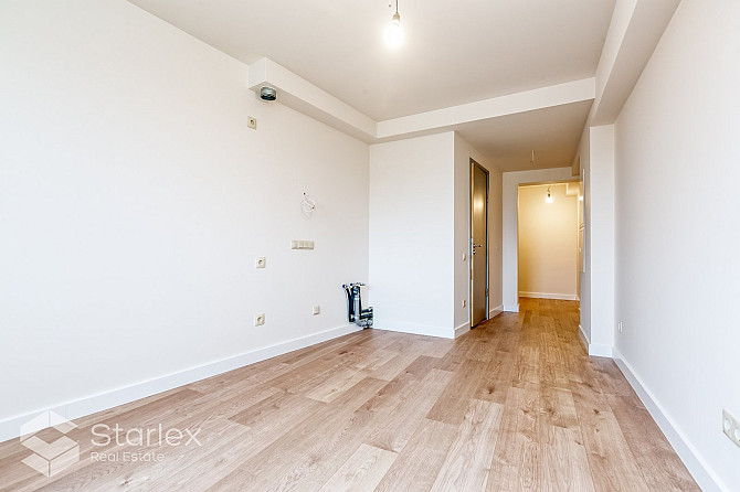 Iegādei pieejams dzīvoklis tikko renovētajā mājā ar lielisku skatu uz Pētersalas un Rīga - foto 13