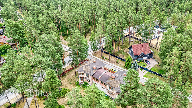 В привлекательном и ухоженном поселке частных домов у озера Лангстиню есть Рижский район - изображение 3