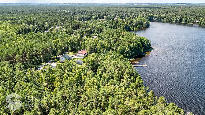 В живописном месте на берегу самого озера Лангстини продается уникальный Рижский район - изображение 7