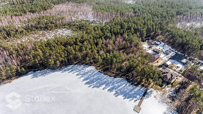 В живописном месте на берегу самого озера Лангстини продается уникальный Рижский район - изображение 18