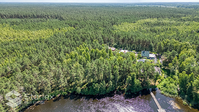 В живописном месте на берегу самого озера Лангстини продается уникальный Рижский район - изображение 5