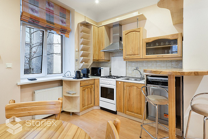 Тихий центр, ул. Я. Алунана 6, 2-комнатная квартира - гостиная, совмещенная с кухней, Рига - изображение 9