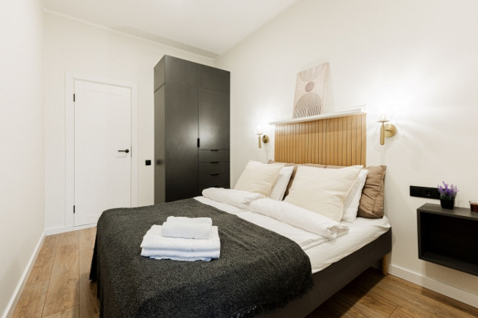 Pieejams ekskluzīvs dzīvoklis īstermiņa īrei Merķeļa ielā 8. Dzīvoklis ir pilnībā Rīga - foto 9