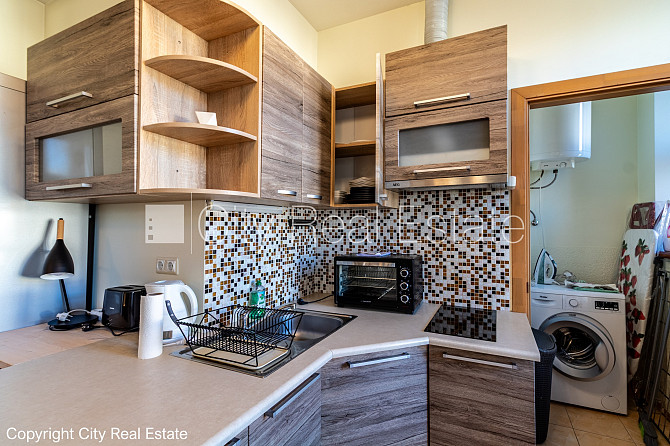 Jaunceltne, fasādes māja, zaļā teritorija, pazemes autostāvvieta, ieeja no ielas, apzaļumota Jūrmala - foto 12