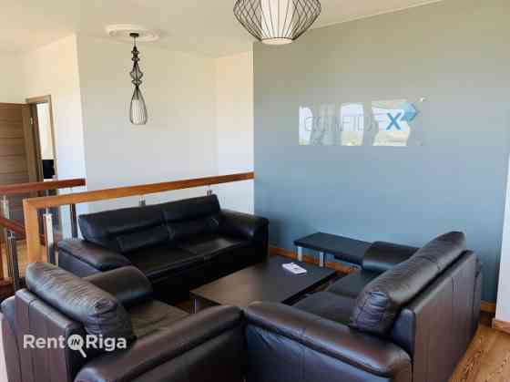 Эксклюзивный двухуровневый пентхаус с впечатляющим панорамным видом на Ригу в Рига