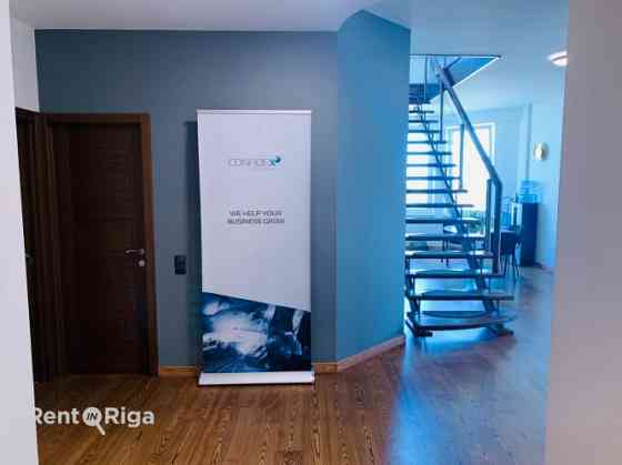 Эксклюзивный двухуровневый пентхаус с впечатляющим панорамным видом на Ригу в Рига