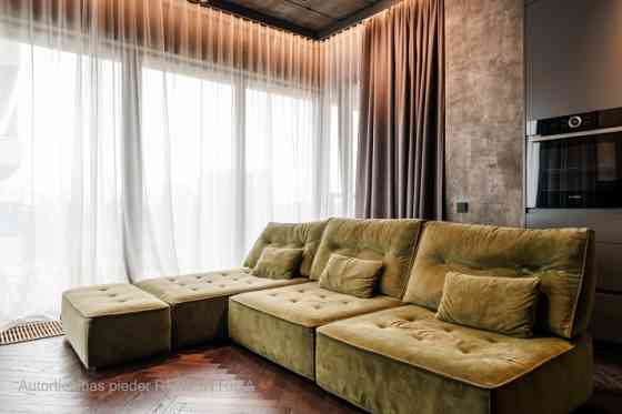 Захватывающая жизнь над крышами города  премиум-квартира в проекте Philosophers Residence. Рига