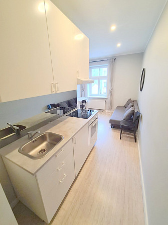 Fasādes māja, renovēta māja, slēgts pagalms, ieeja no ielas, kāpņu telpa pēc kapitālā Rīga - foto 9