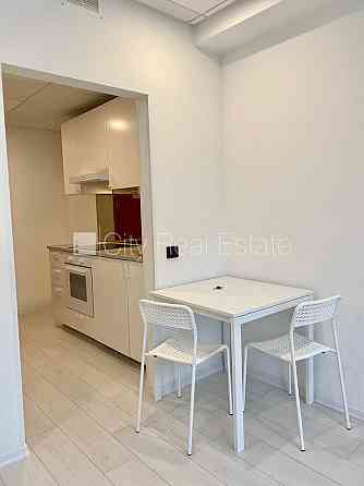 Фасадный дом, реновированный дом, вход с улицы, лифт, лестничная клетка после Rīga