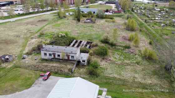 Земельный участок в зоне промышленной застройки, в центре Пиньки.  + Рижский район