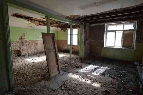 Premises located on the ground floor of a wooden residential building.  Total area of the premises:  Рига