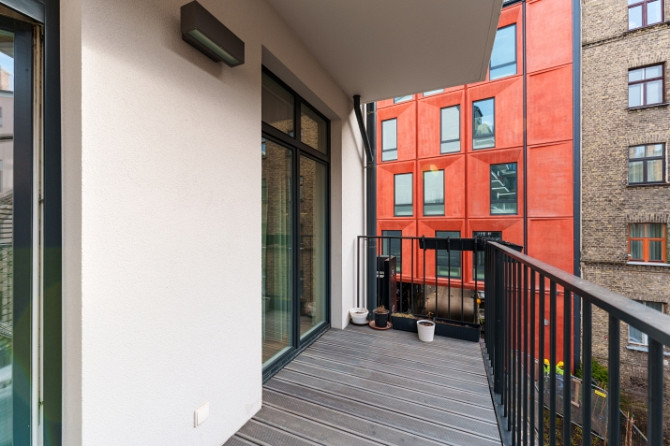 Izīrē elegantu 2-istabu dzīvokli prestižajā 