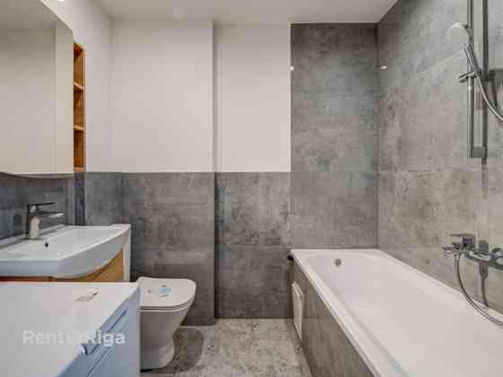 Предлагается уникальная мансардная квартира в новом проекте на улице Katoļu 11  с Rīga