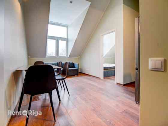 Предлагается уникальная мансардная квартира в новом проекте на улице Katoļu 11  с Рига